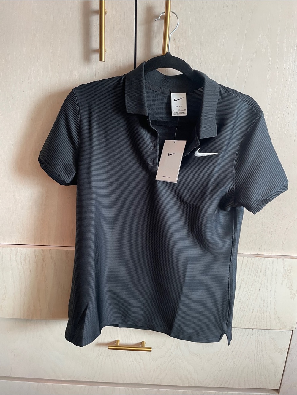 Nike Men’s Black Polo with White Swoosh